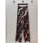 Pucci vintage print set: draped shirt paired with high-waisted wide-leg pants in sizes S, M, and L
