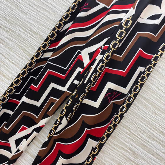 Pucci vintage print set: draped shirt paired with high-waisted wide-leg pants in sizes S, M, and L