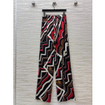 Pucci vintage print set: draped shirt paired with high-waisted wide-leg pants in sizes S, M, and L