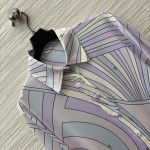 Pucci's purple-toned turtleneck shirt paired with pants, the gentle purple hue evokes a sense of relaxation, with abstract lines outlining a laid-back style. The fabric is smooth and silky, available in sizes S, M, and L