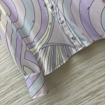 Pucci's purple-toned turtleneck shirt paired with pants, the gentle purple hue evokes a sense of relaxation, with abstract lines outlining a laid-back style. The fabric is smooth and silky, available in sizes S, M, and L