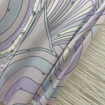 Pucci's purple-toned turtleneck shirt paired with pants, the gentle purple hue evokes a sense of relaxation, with abstract lines outlining a laid-back style. The fabric is smooth and silky, available in sizes S, M, and L