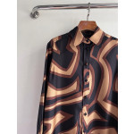 Pucci silk shirt features Labirinto print and is made of 100% heavyweight silk twill. Size options: 36, 38, 40, 42