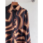 Pucci silk shirt features Labirinto print and is made of 100% heavyweight silk twill. Size options: 36, 38, 40, 42