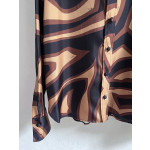 Pucci silk shirt features Labirinto print and is made of 100% heavyweight silk twill. Size options: 36, 38, 40, 42