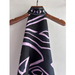 Pucci silk halter top with print, made of 100% silk twill, featuring a signature geometric swirl print all over. It has a halter neckline, a backless design with lace-up details, and each printed piece is unique.