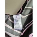Pucci silk halter top with print, made of 100% silk twill, featuring a signature geometric swirl print all over. It has a halter neckline, a backless design with lace-up details, and each printed piece is unique.