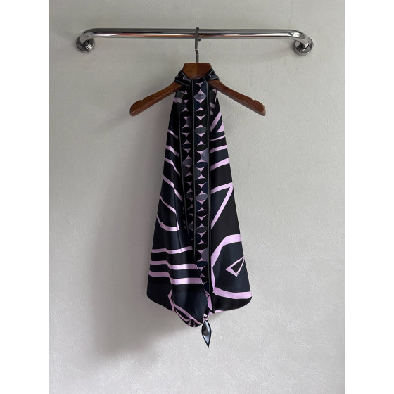 Pucci silk halter top with print, made of 100% silk twill, featuring a signature geometric swirl print all over. It has a halter neckline, a backless design with lace-up details, and each printed piece is unique.