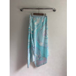 Pucci irregular silk skirt, made of 100% twill silk, features a signature geometric swirl print throughout the entire body, with the "Orchidee" print covering the entire body. The asymmetric skirt comes in sizes 36, 38, 40, and 42