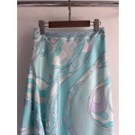 Pucci irregular silk skirt, made of 100% twill silk, features a signature geometric swirl print throughout the entire body, with the "Orchidee" print covering the entire body. The asymmetric skirt comes in sizes 36, 38, 40, and 42