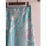 Pucci irregular silk skirt, made of 100% twill silk, features a signature geometric swirl print throughout the entire body, with the "Orchidee" print covering the entire body. The asymmetric skirt comes in sizes 36, 38, 40, and 42