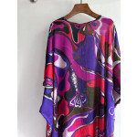 Pucci smock dress made of 100% lightweight cotton, featuring a round neck, tie-back straps, a loose silhouette, and Orchidee multi-color printing