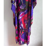 Pucci smock dress made of 100% lightweight cotton, featuring a round neck, tie-back straps, a loose silhouette, and Orchidee multi-color printing