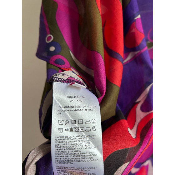 Pucci smock dress made of 100% lightweight cotton, featuring a round neck, tie-back straps, a loose silhouette, and Orchidee multi-color printing