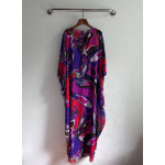 Pucci smock dress made of 100% lightweight cotton, featuring a round neck, tie-back straps, a loose silhouette, and Orchidee multi-color printing