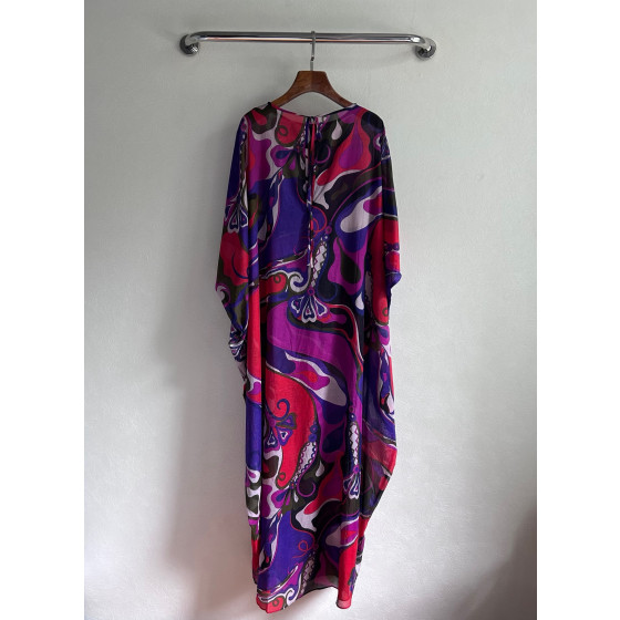 Pucci smock dress made of 100% lightweight cotton, featuring a round neck, tie-back straps, a loose silhouette, and Orchidee multi-color printing