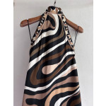 Pucci silk halter dress features the classic "Marmo" swirl pattern surrounding print. This mid-length dress is made of heavyweight twill silk satin. Size options: 36, 38, 40, 42