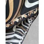 Pucci silk halter dress features the classic "Marmo" swirl pattern surrounding print. This mid-length dress is made of heavyweight twill silk satin. Size options: 36, 38, 40, 42