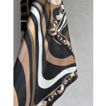 Pucci silk halter dress features the classic "Marmo" swirl pattern surrounding print. This mid-length dress is made of heavyweight twill silk satin. Size options: 36, 38, 40, 42