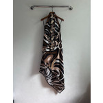 Pucci silk halter dress features the classic "Marmo" swirl pattern surrounding print. This mid-length dress is made of heavyweight twill silk satin. Size options: 36, 38, 40, 42