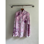 Pucci silk shirt, 100% heavyweight twill silk, multi-colored abstract print, classic collar shape, with matching buttons and a loose, straight hem, featuring random placement, each piece having a unique print. Size options: S, M, L, XL