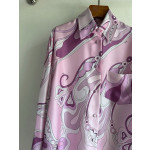 Pucci silk shirt, 100% heavyweight twill silk, multi-colored abstract print, classic collar shape, with matching buttons and a loose, straight hem, featuring random placement, each piece having a unique print. Size options: S, M, L, XL