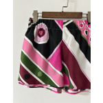 Pucci colorful silk shorts, made of heavy-weight 19-micron twill silk, feature a random print of Vivara psychedelic swirls. They have an elastic waistband and side slit pockets. Size options: 36, 38, 40, 42