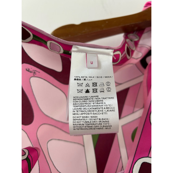 Pucci's silk floral-print halter dress is made of 100% twill silk, featuring a signature geometric swirl print all over. It adopts a self-fastening neck and back design, making each piece unique. Size: one size fits all