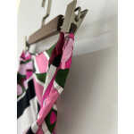 Pucci silk wide-leg pants, made of heavyweight 19-micron twill silk, feature a Vivara psychedelic swirl pattern with a fixed-cut print. They have a side zipper closure and are cut into a flowing silhouette. Size options include: 36, 38, 40, 42