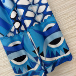 Pucci's blues silk floral print suit, made of 100% aligned silk, boasts a sleek and draping texture. The cool blues contrast with other colors, exuding a vintage artistic vibe