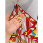 Pucci Chain‑Detail Halter Top ✨ 100% heavyweight silk twill. Show‑stopping colorful pattern. Features a gold‑toned chain halter strap embellished with the signature fish‑shaped pendant.  Size: One‑size‑fits‑all