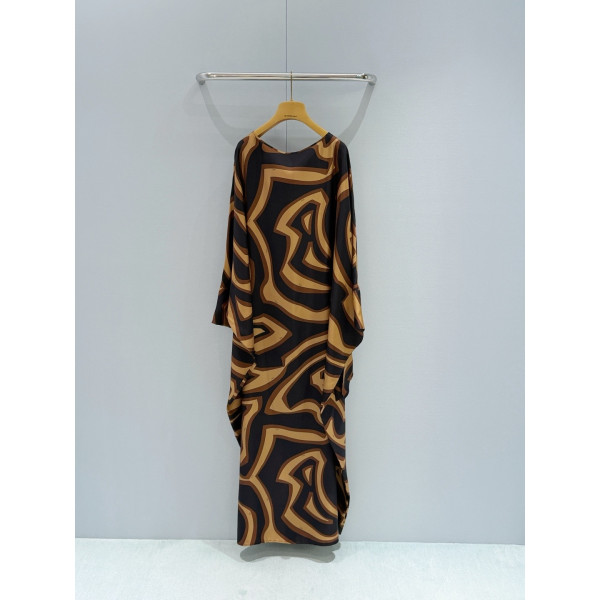 Pucci Silk Caftan Dress ✨ Crafted from premium 100% silk twill, adorned with black‑and‑gold Labirinto print. Features a roomy silhouette and cape‑style sleeves that tie at the wrists.  Size: One‑size‑fits‑all