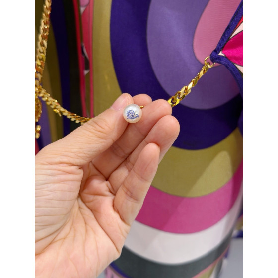 PUCCI Chain‑Detail Halter Top ✨ 100% heavyweight silk twill in iris purple tones. Features a gold‑toned chain halter strap embellished with the signature fish‑shaped pendant.  Size: One‑size‑fits‑all